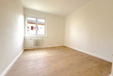 Appartement de 4 pièces au 1er étage avec balcon